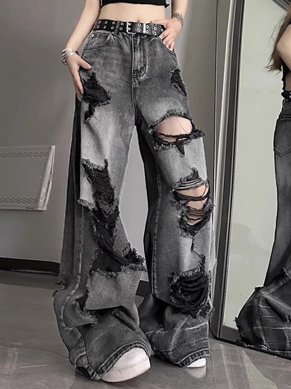 Jeans de novio rasgado negro con efecto lavado