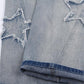 Faded vintage boyfriend jeans with star patch