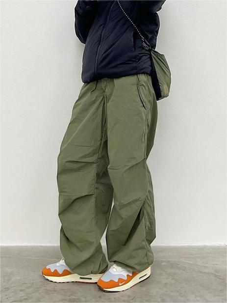 Green oversize parachute cargo pants with drawstring
