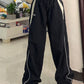 Black baggy oldschool sweatpants with contrast piping