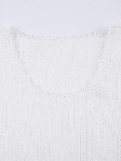 Blusa de punto blanca de manga larga con ribete de encaje