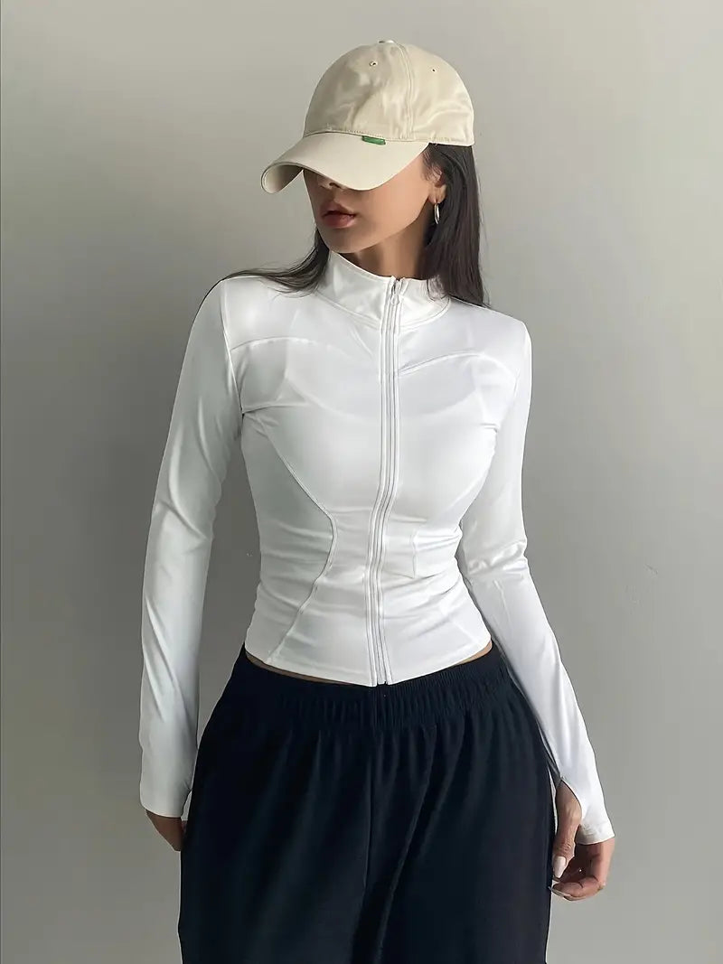 Top retro blanco de manga larga con cuello alto y cremallera