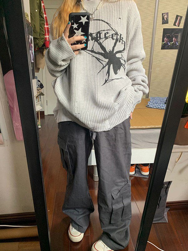Gray punk rib knit sweater with printed spider