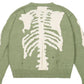 Green oversized skeleton knit jumper