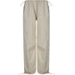 Light colored baggy parachute cargo pants with drawstring and low waist