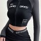 Dark long sleeve crop top with zipper and patchwork