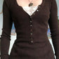 Long-sleeved knitted top with lace pattern and buttons